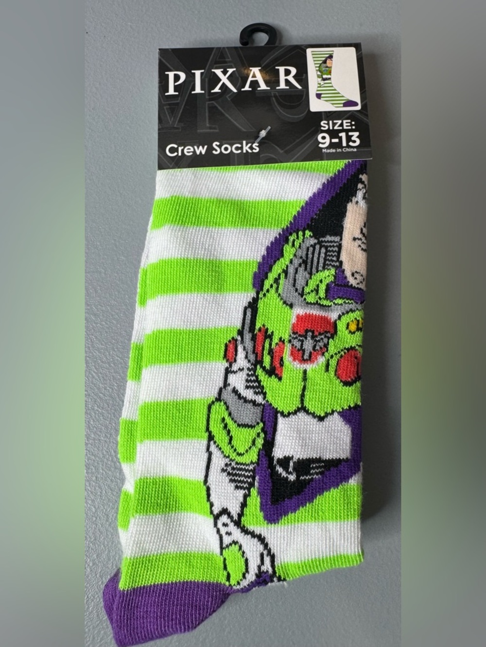 Disney Pixar Buzz Lightyear Green & White Striped Crew Socks unisex graphic
